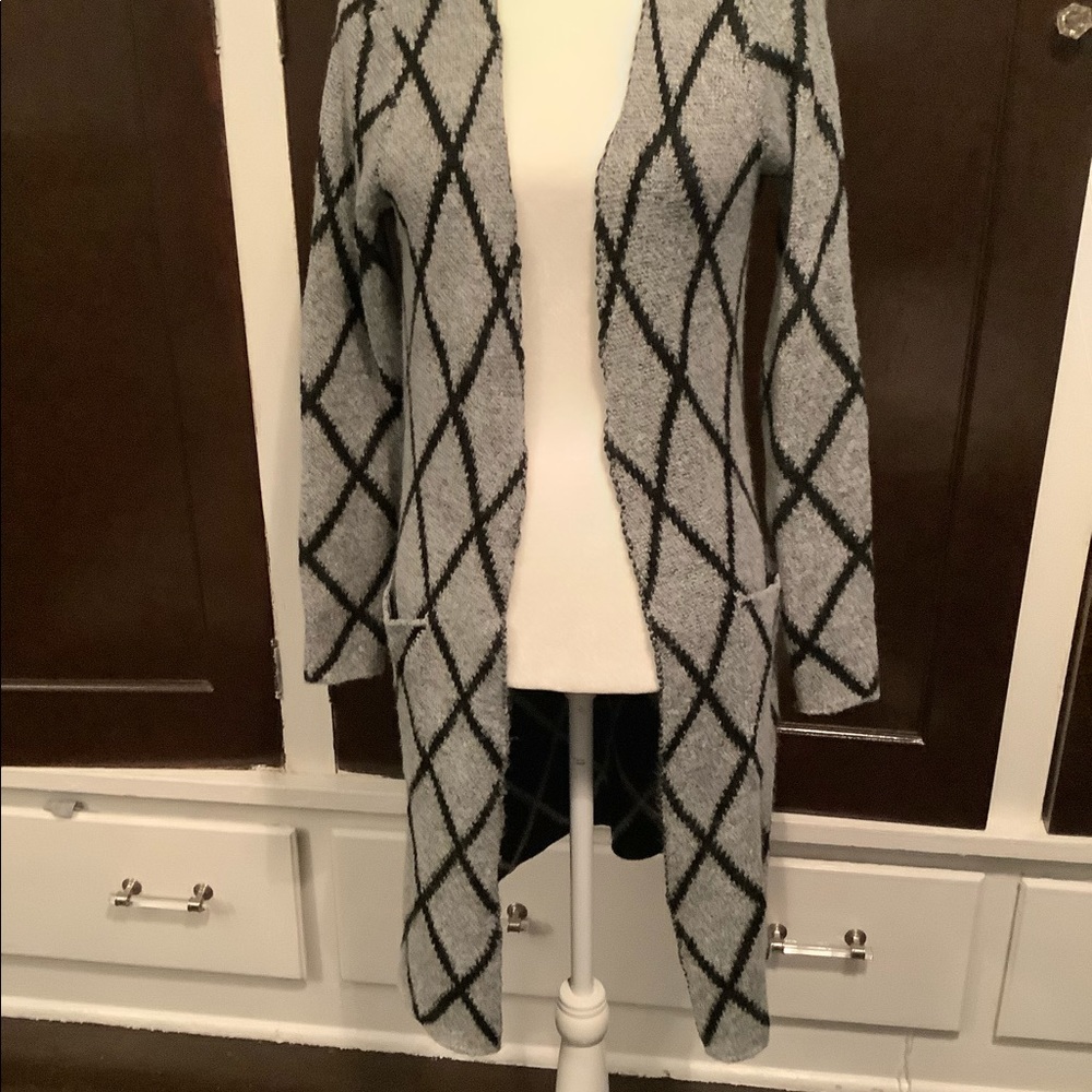Gray and Black cardigan sweater.